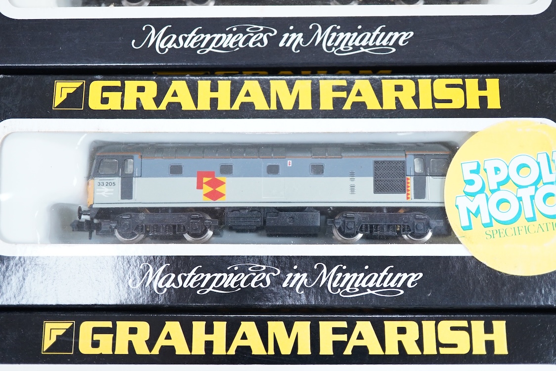 Four boxed Graham Farish N gauge railway Class 33 Bo-Bo diesel-electric locomotives; a BR, 33 205 (8317), a BR, 33 056 (8316), a BR, Sultan 33 025 (8312) and an EWS, 33030 (831A).